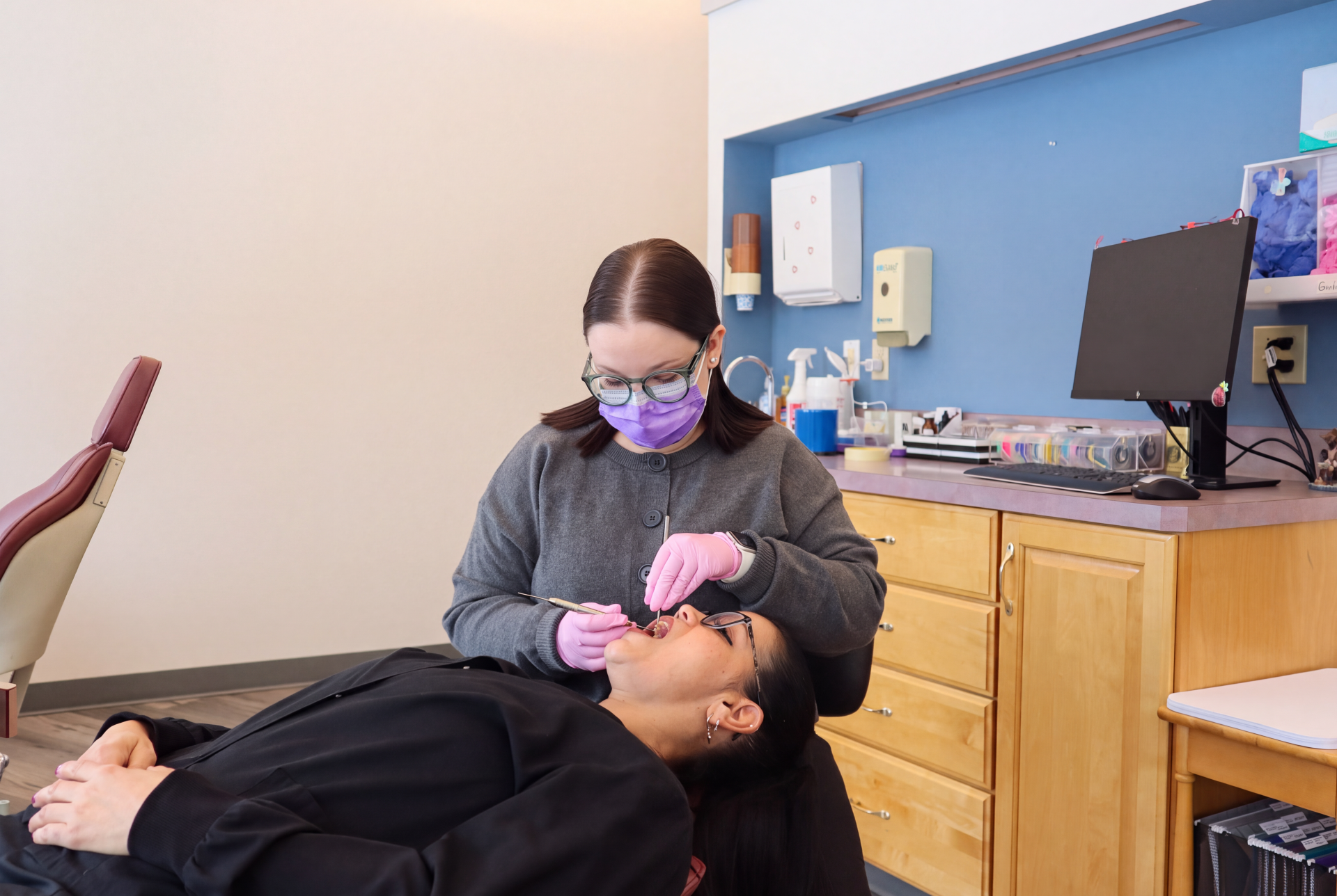 Orthodontist and patient in a clinical setting