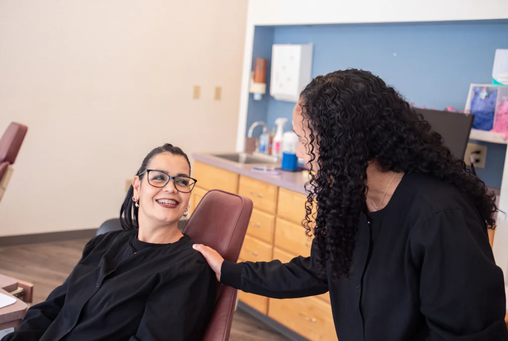 Two individuals in a clinical setting